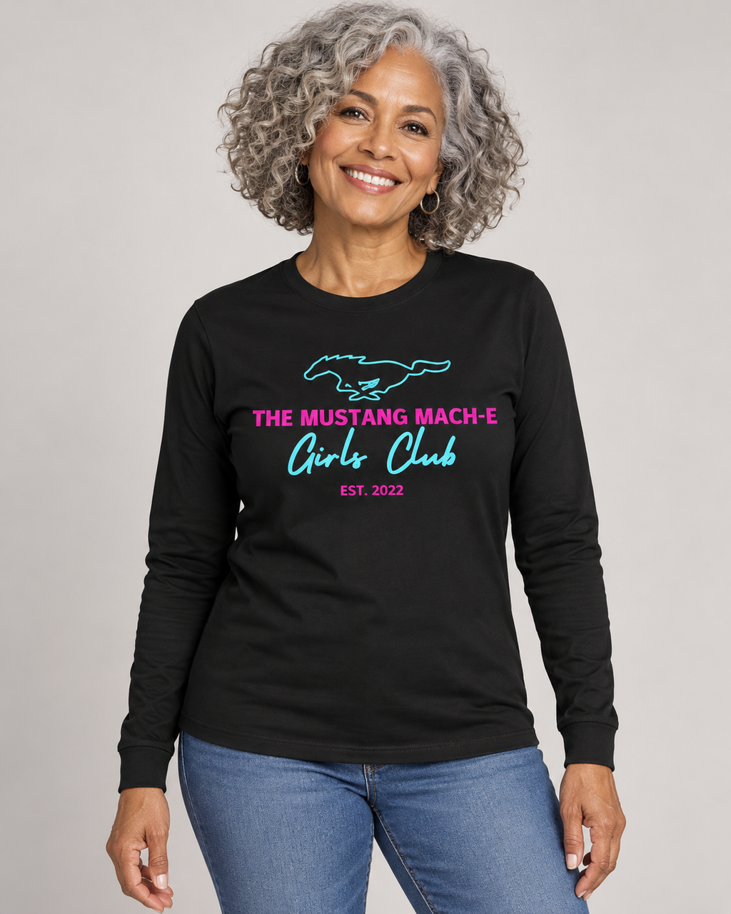 Gray-haired woman modeling the Original Design black long-sleeve shirt